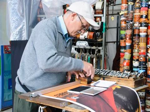 Man making posters Stock Photos