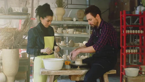Man Is Making Pot With Instructor Stock Footage 169056490
