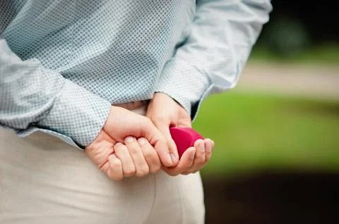 Man making proposal with wedding ring and gift box, wedding concept, happy Stock Photos