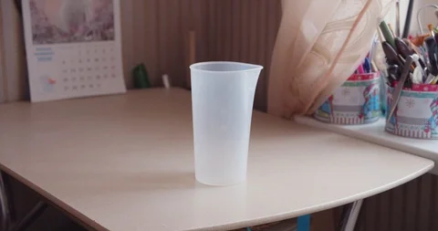 Man making a protein shake at home Stock Footage 124356934