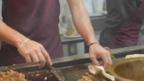 A man is making a quesadilla Stock Footage 139656694