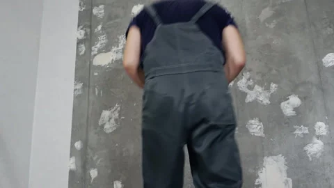 A man is making repairs in an apartment. Stock Footage 255902533