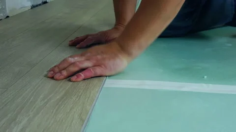 A man is making repairs in an apartment. Stock Footage 263748818