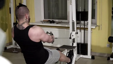 Man making row exercise in the gym Video stock 74137343