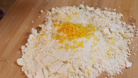 A man is making sand dough for a pie. Close-up of hands Stock Footage 286097244