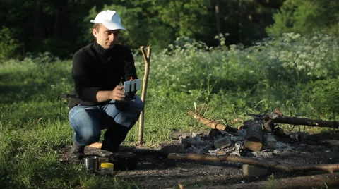 Man making selfie by smartphone in camping Stock Footage 64058061