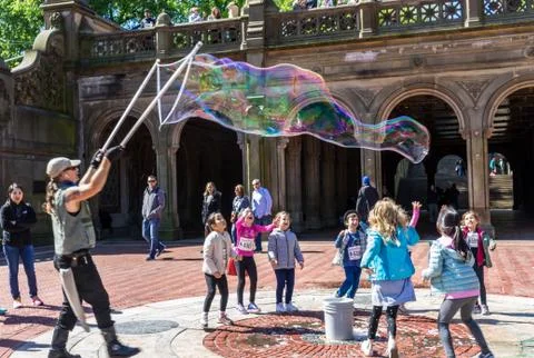 Man making soap bubbles Stock Photos