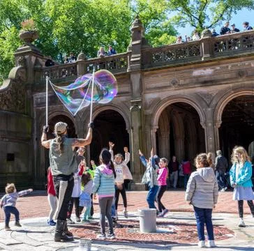 Man making soap bubbles Stock Photos