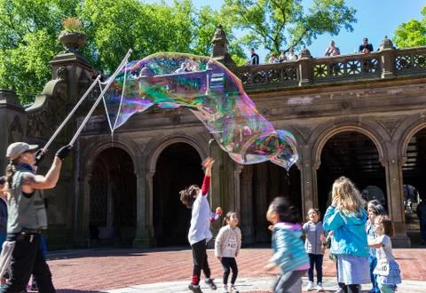 Man making soap bubbles Stock Photos