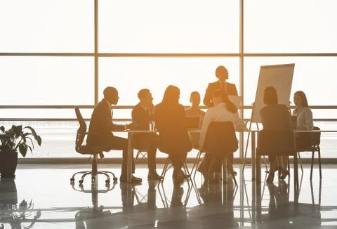 Man making startup analysis to colleagues Stock Photos