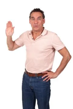 Man making stop sign looking surprised Stock Photos