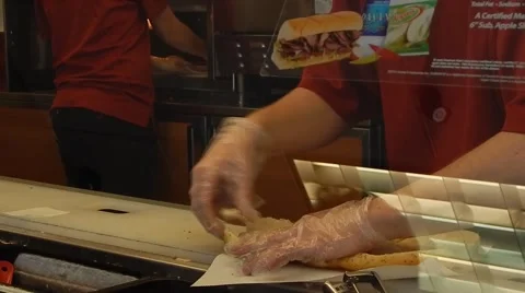 Man making subway sandwich Stock Footage 45314742