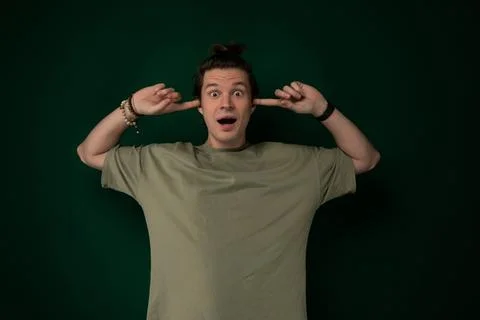 Man Making a Surprised Face With Hands Stock Photos