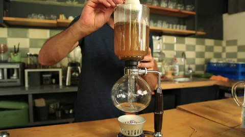 The man is making Syphon Coffee Stock Footage 65483825