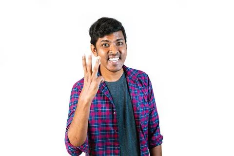 Man making three-finger gesture Stock Photos