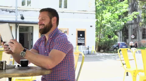 Man making video call by tablet, slider shot left Vídeos de archivo 67628557