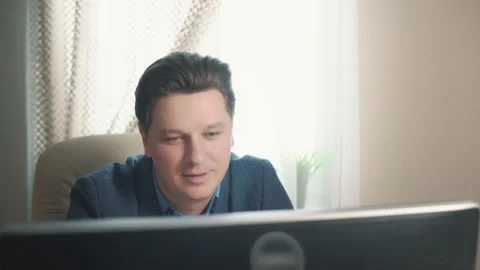 Man making video call using computer Stock Footage 171963873