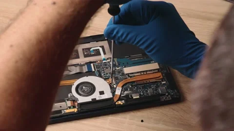 Man male engineer technician hands gloves repair laptop portable device Stock Footage 207857341