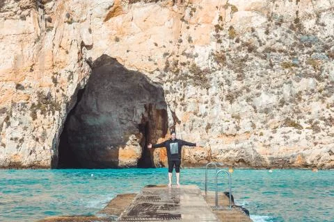 Man on Malta Cliff Stock Photos