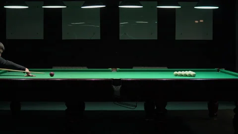 A man a man breaks a pyramid of white billiard balls. Start playing Russian Stock Footage 146808838