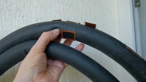 Man man patching rubber tube of bicycle patches visible hands man camera 스톡 동영상 327523242
