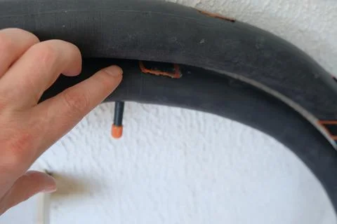 Man man patching rubber tube of bicycle patches visible hands man camera Stock Photos