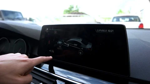 Man manages car digital dashboard Stock Footage 89934709