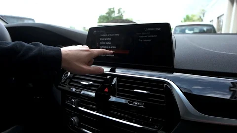 Man manages car menu on digital dashboar... | Stock Video | Pond5