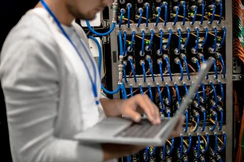 Man Managing Supercomputer Servers 스톡 사진