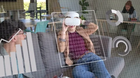 Man manipulating tablet, starting AR data collection, woman donning VR headset Stock Footage 333494298