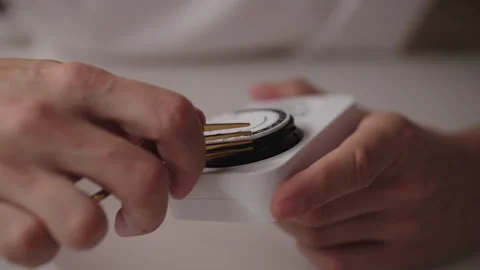 Man manipulating timer switch with metal fork, revealing dangerous electrical 動画素材 318308241