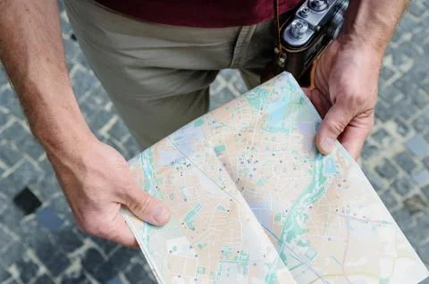 A man with  map. Stock Photos