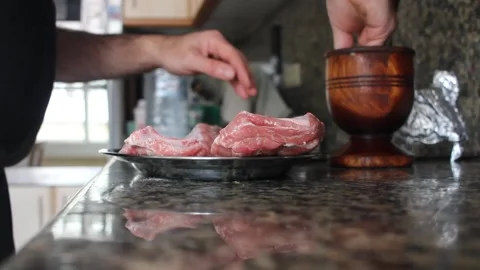 Man marinating meat with marinade Stock Footage 241441043