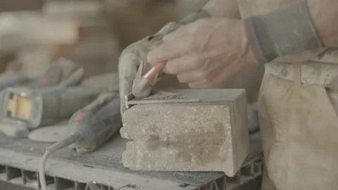 Man is marking concrete to be cut Stock Footage 146197566