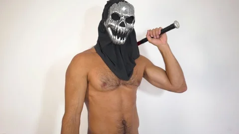 A man in a mask with a bat, on a white background, a naked torso Stock-Footage 120463479
