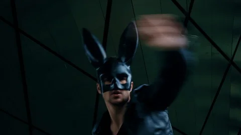 Man in the mask of a hare is dancing Stock Footage 98836233