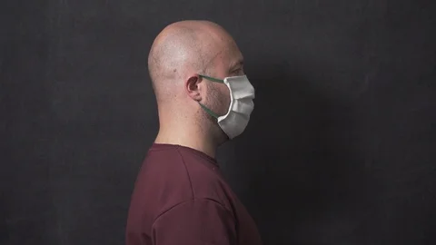 Man is in mask in isolation Stock Footage 127238069