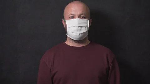 Man is in mask in isolation time Stock Footage 127240448