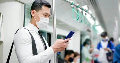 Man with mask in metro Stock Footage 128303102