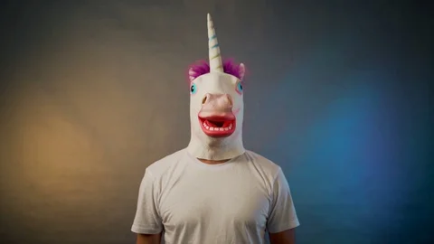 the man in the mask much the unicorn sha... | Stock Video | Pond5