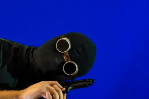 The man in the mask. Stock Photos