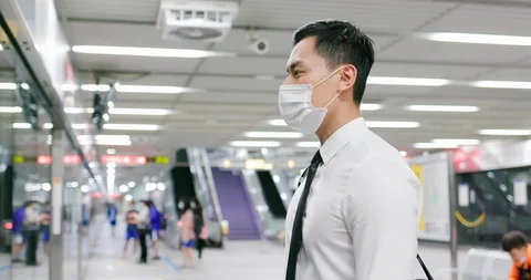 Man with mask in station Stock Footage 128293329