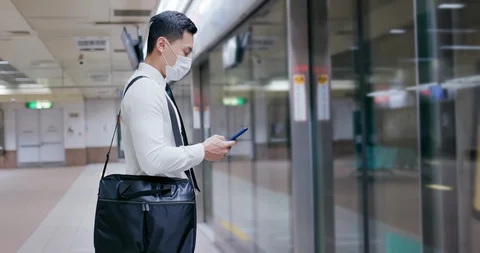 Man with mask in station Stock Footage 128630941