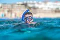 The man with mask swim in the ocean Photo