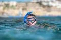 The man with mask swim in the sea Photo