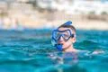 The man with mask swim in the sea Photo