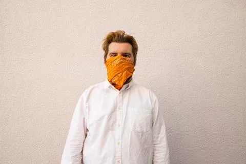 Man in mask textile cloth object on face protection hand made from infection  Stock Photos