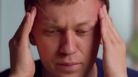 A man massages his temples, headache, close-up Stock Footage 142733447