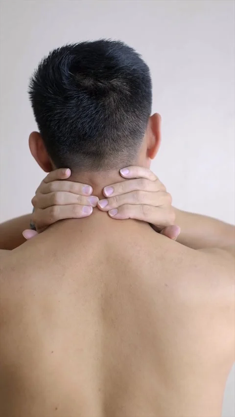 Man Massaging Neck from Behind Stock Footage 310070475