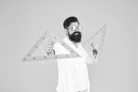 Man math lesson. Bearded nerd triangle. Geometry teacher. Student using Foto stock